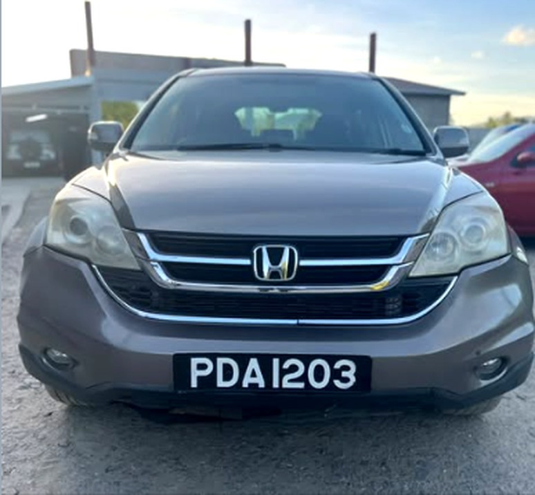 Gray Honda CR-V featured by Toiz Wit Noiz Auto Sales